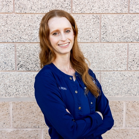 Rachael M. Prokes, DDS in Scrubs