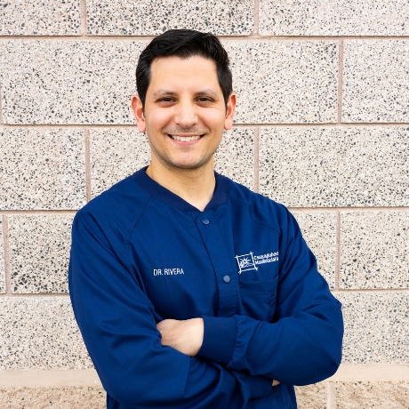 Cesar A. Rivera, DMD, MD in Scrubs