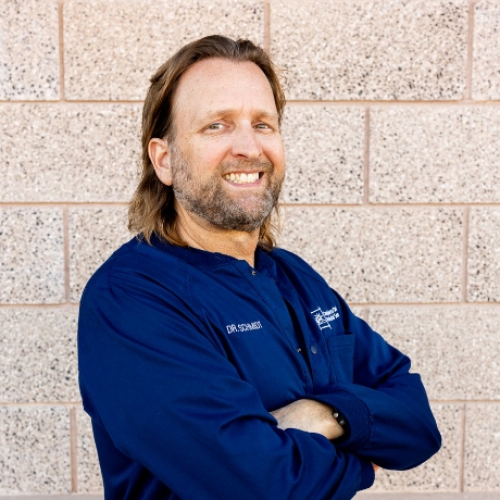 John M. Schmidt, DMD in Scrubs
