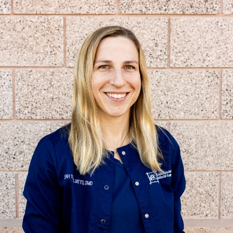 Dr. Leah Turigliatto, DMD in Scrubs